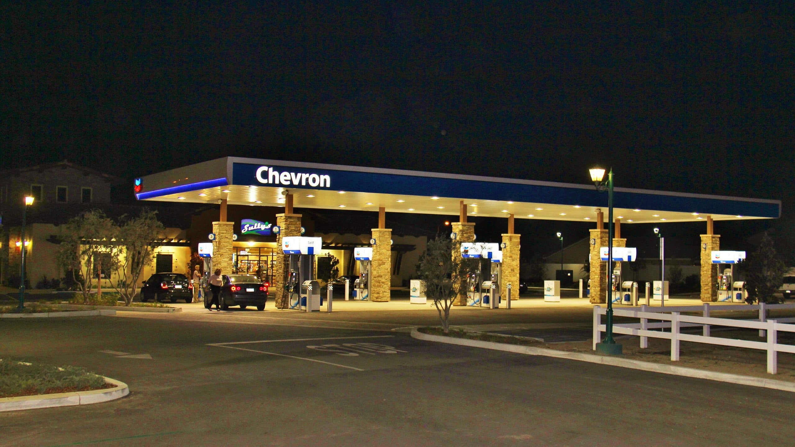 Sully's Chevron lit up at night