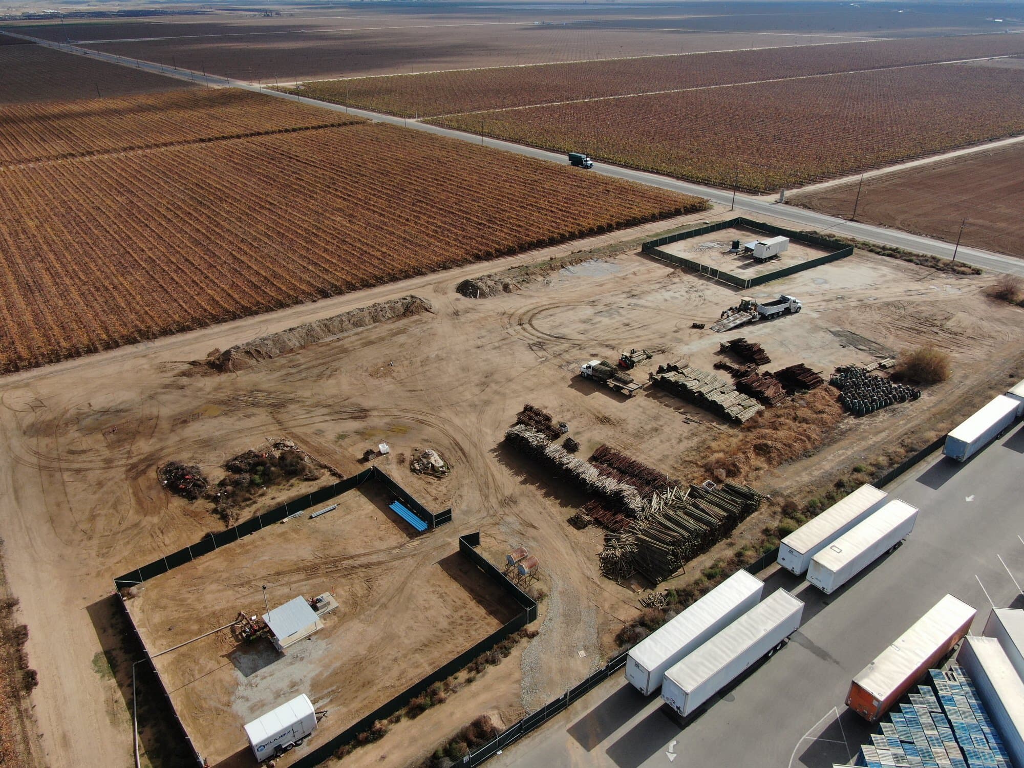 The graded pad, laydown yard and site trailers at the Califia Farms site in Bakersfield, before vertical construction began